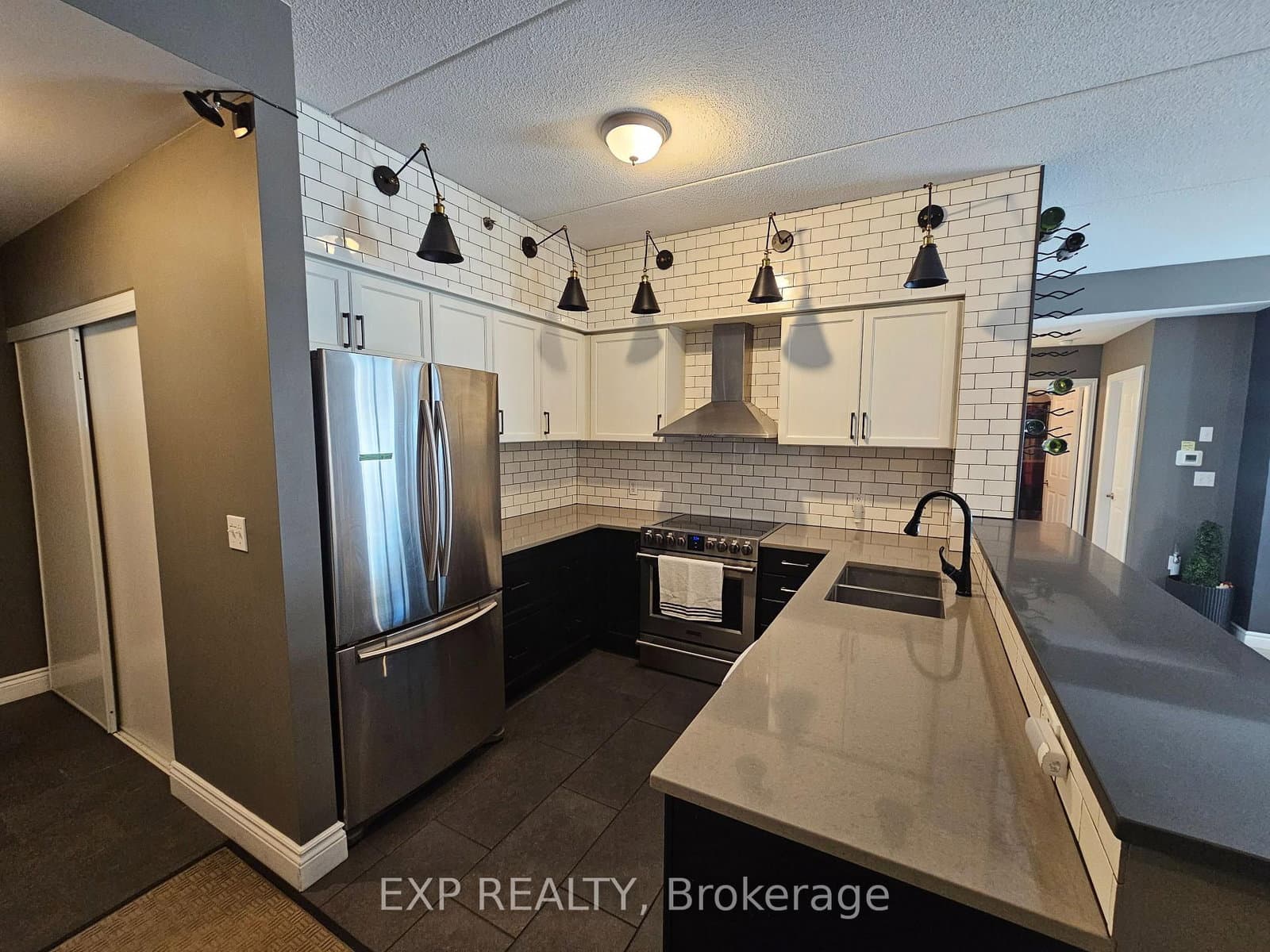 #102 - 308 Watson Parkway N